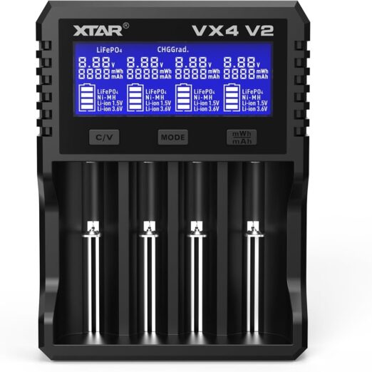 XTAR VX4 V2 four-bay battery charger with a blue backlit display and four battery icons, showing charging status for Li-ion and Ni-MH cells