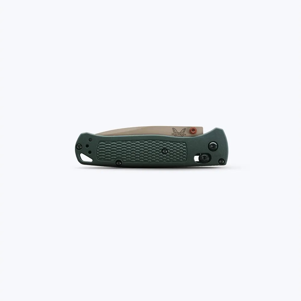 Green textured-handle folding knife in the closed position on a light background, blade partially visible at the top edge.