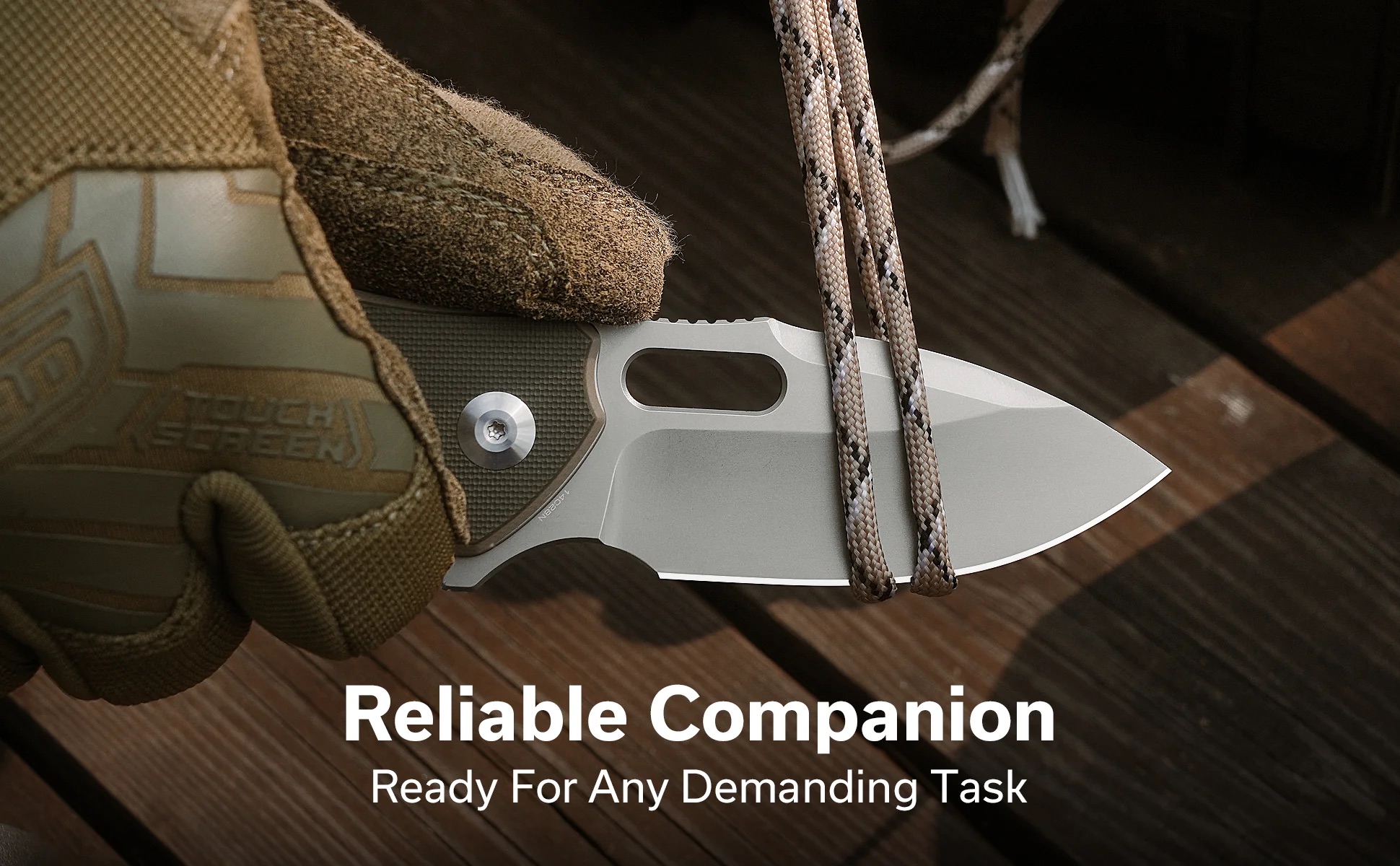 Close-up of a gray tactical knife with braided paracord beside a tan rugged boot on a wooden surface, conveying outdoor readiness.