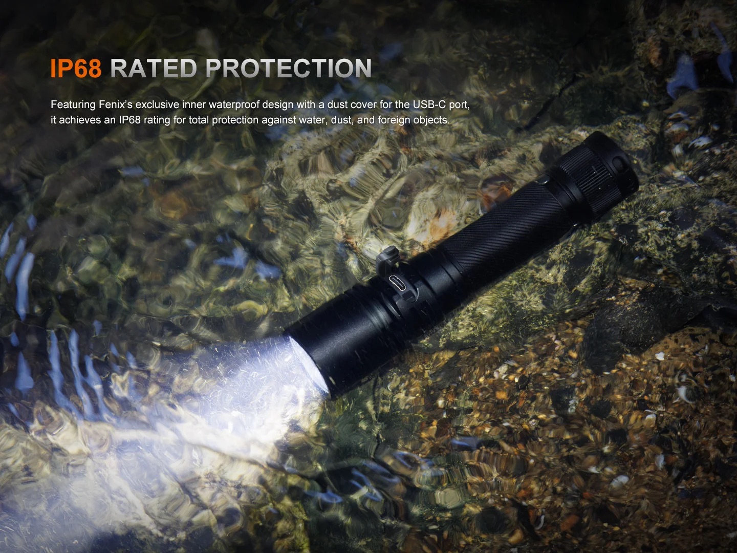 Black flashlight submerged in clear water with rocky bottom, illustrating IP68 rated protection text overlay.