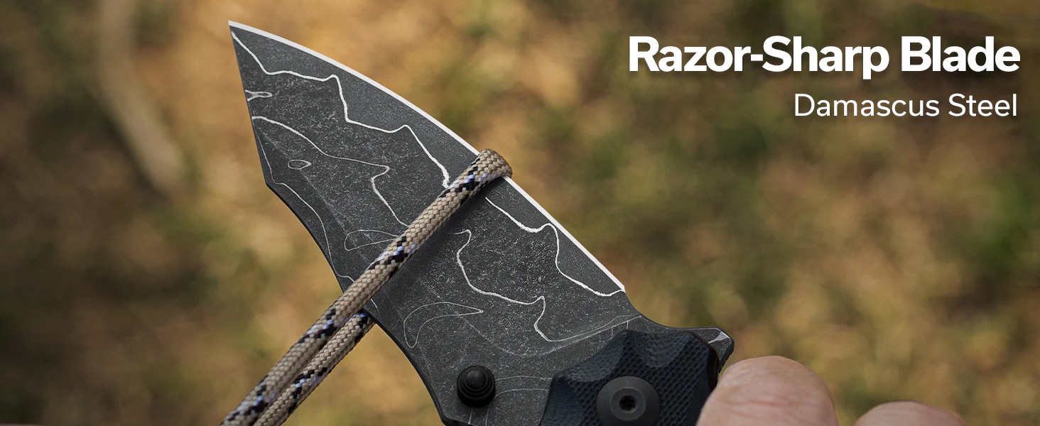 Close-up of a razor-sharp Damascus steel knife blade with a braided cord wrapped across it, outdoor background.