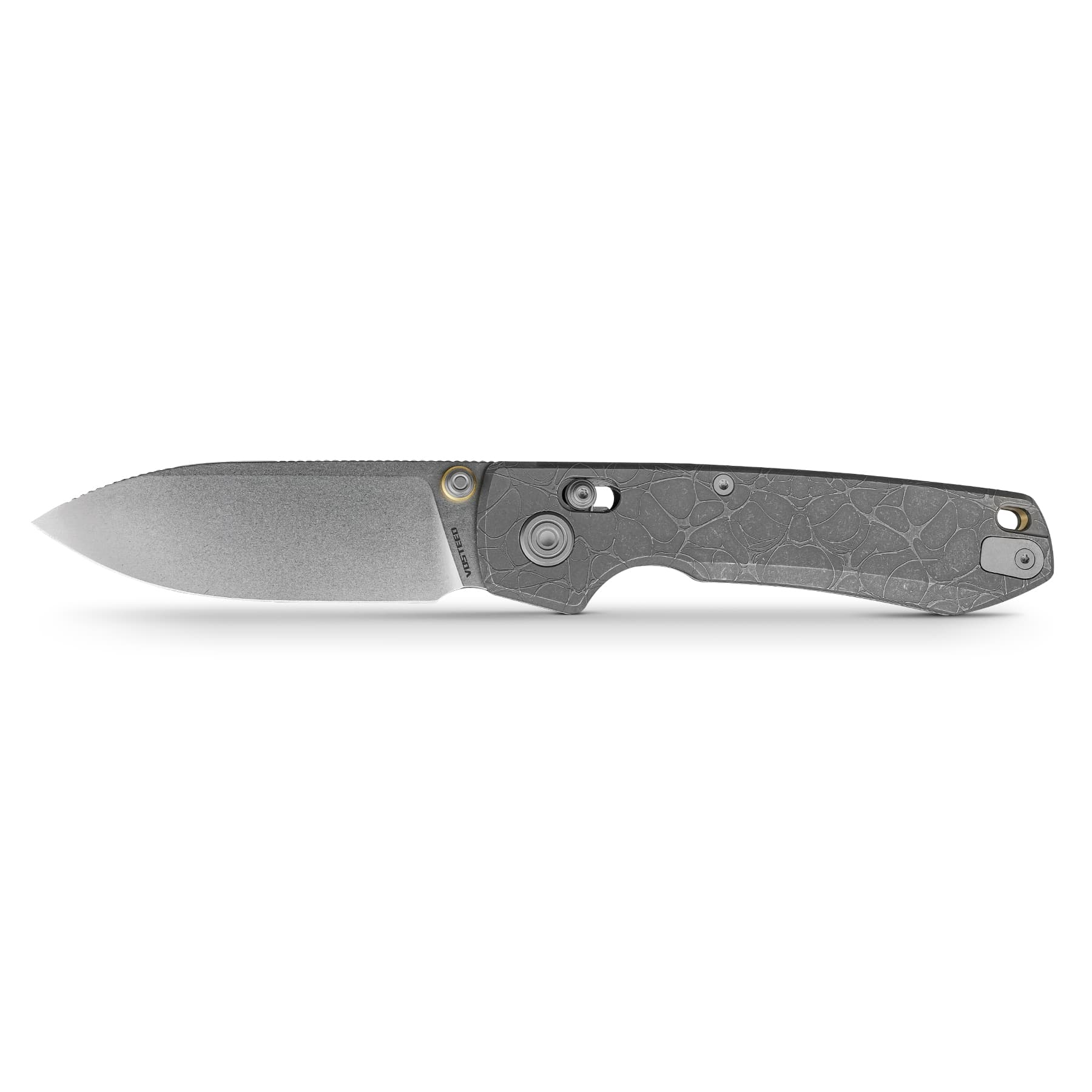 Partial view of a grey folding knife with a textured handle, blade extended to the left against a white background