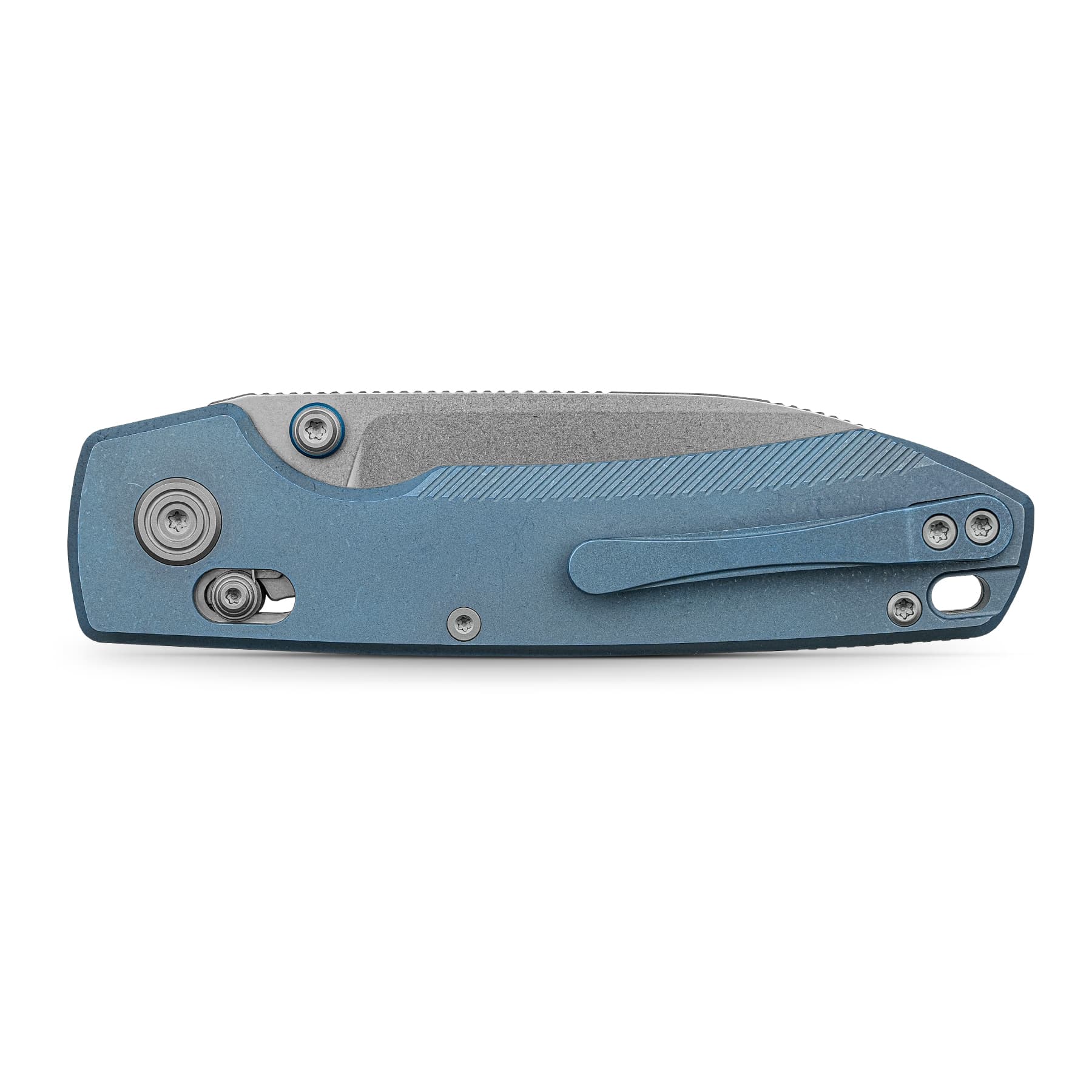 Close-up side view of a blue folding knife handle with visible screws and textured grip along the bottom edge