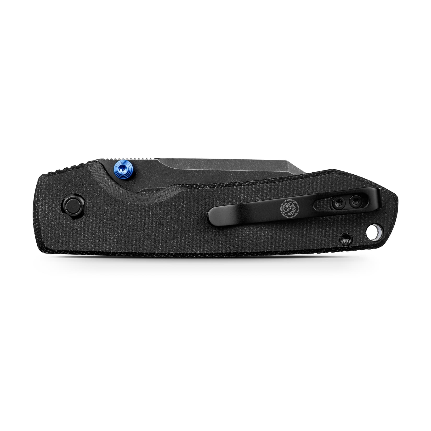 Close-up of a black textured folding knife handle with a blue pivot screw and a black pocket clip showing a logo on the clip.