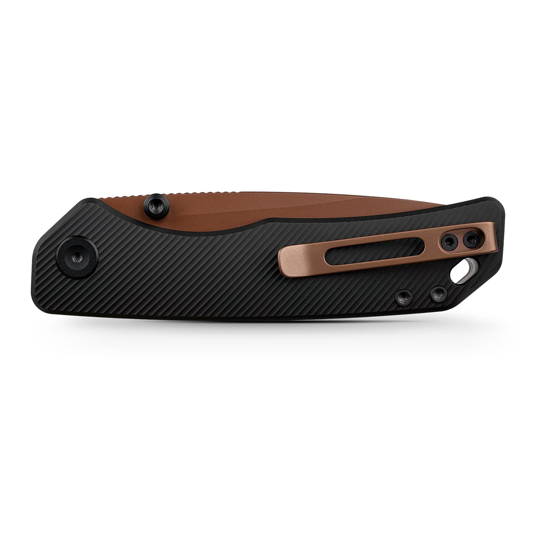 Close-up of a folding knife handle with a black textured grip and bronze clip becoming visible near the midsection.