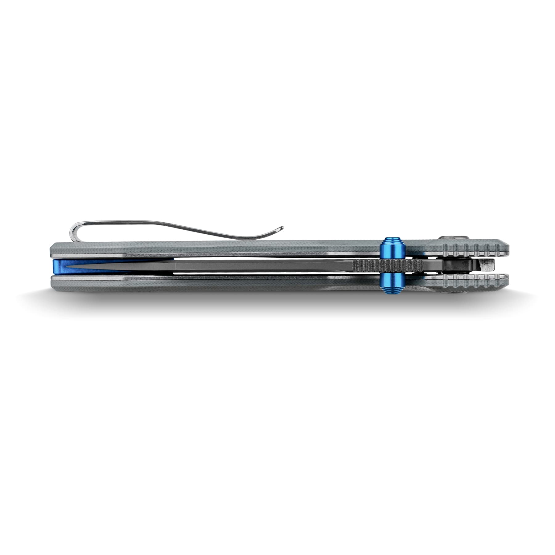 Close-up side view of an industrial precision instrument with a textured gray base, blue adjustment knobs, and a curved steel wire resting on top.