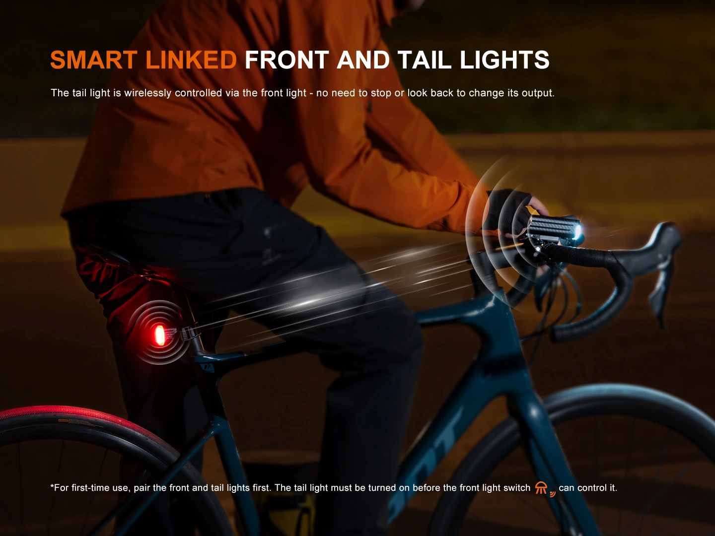 Cyclist riding at night with a bright front headlight and a red rear light on a blue bike, illustrating a smart linked lighting system.