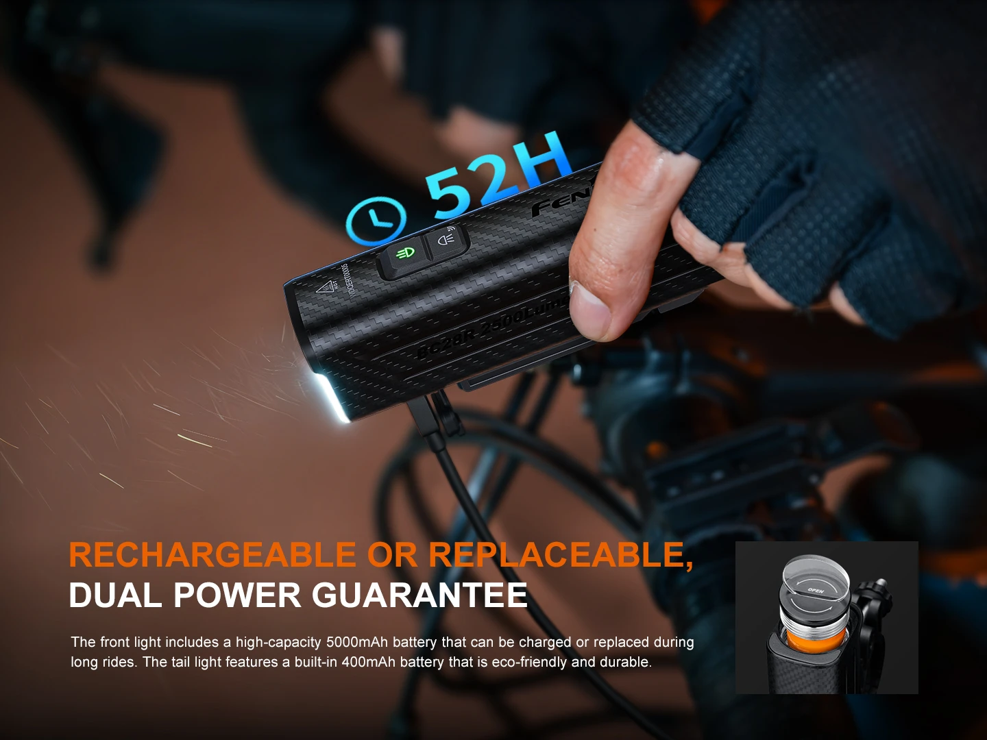 E-bike front light battery pack being held by gloved hand, highlighting rechargeable/replaceable dual-power feature.