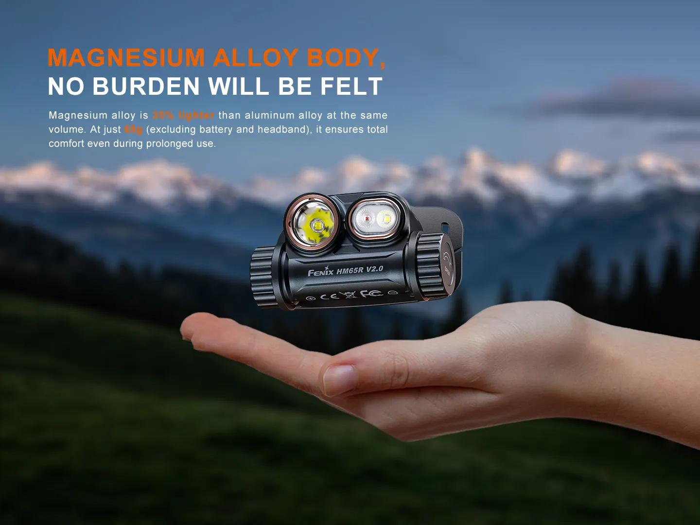 Promotional image showing a compact dual-LED flashlight held above an open hand with a mountain landscape in the background, emphasizing its lightweight magnesium alloy body.
