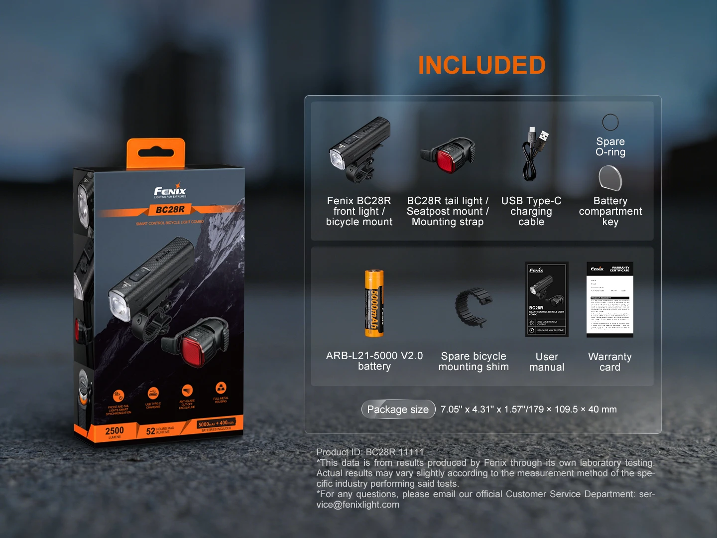 Fenix BC28R bike light kit in box with front and tail lights plus accessories shown on a display panel: batteries, USB-C charging cable, spare parts, and user manual.