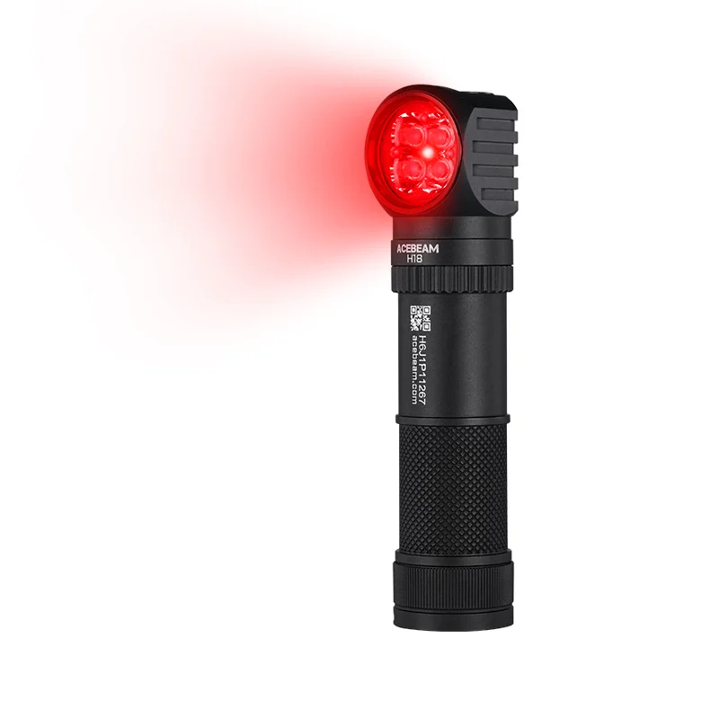Compact black tactical flashlight emitting a bright red LED beam forward, textured grip visible.